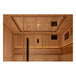 Wooden sauna interior with benches and ceiling lights.