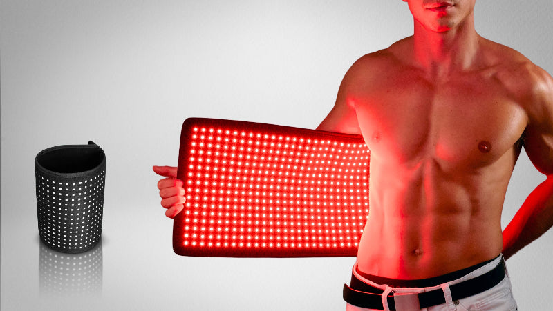 Man holding a red light therapy panel with a gray background
