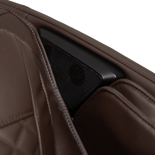 Close-up of a brown car seat with a speaker embedded in it.
