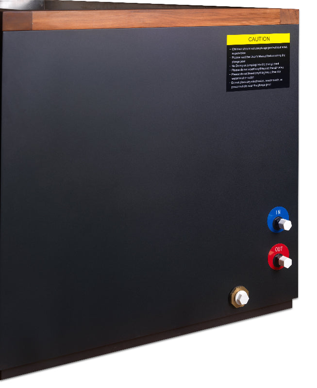 Black cold plunge with connection  ports and a caution label on a white background