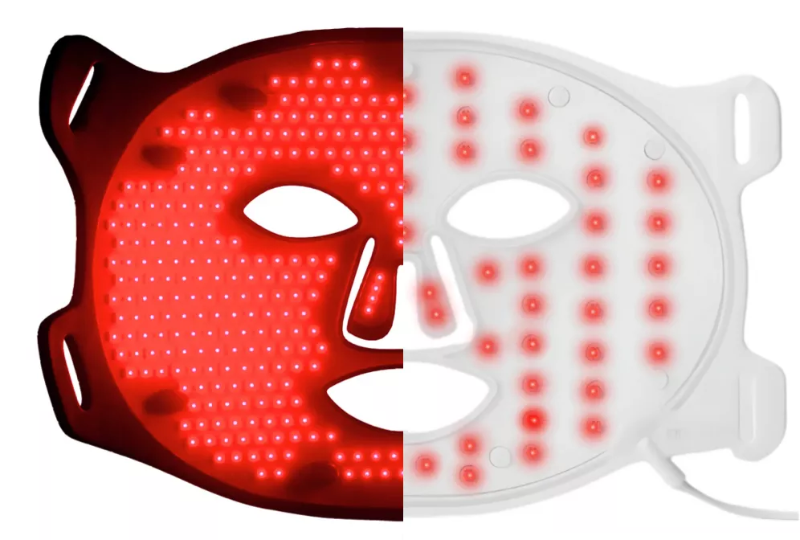 LED face mask with red and white lights on a white background