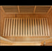Wooden sauna interior with slatted ceiling and floor.
